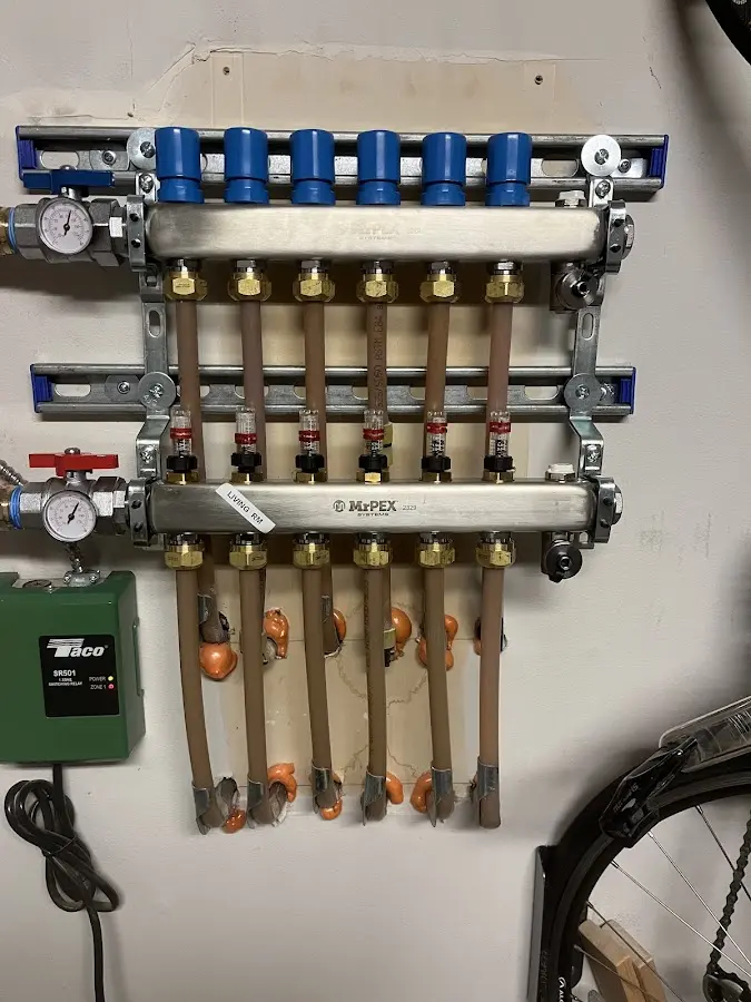 Plumber performing Water Heater Repair at a residential property in Stewartville